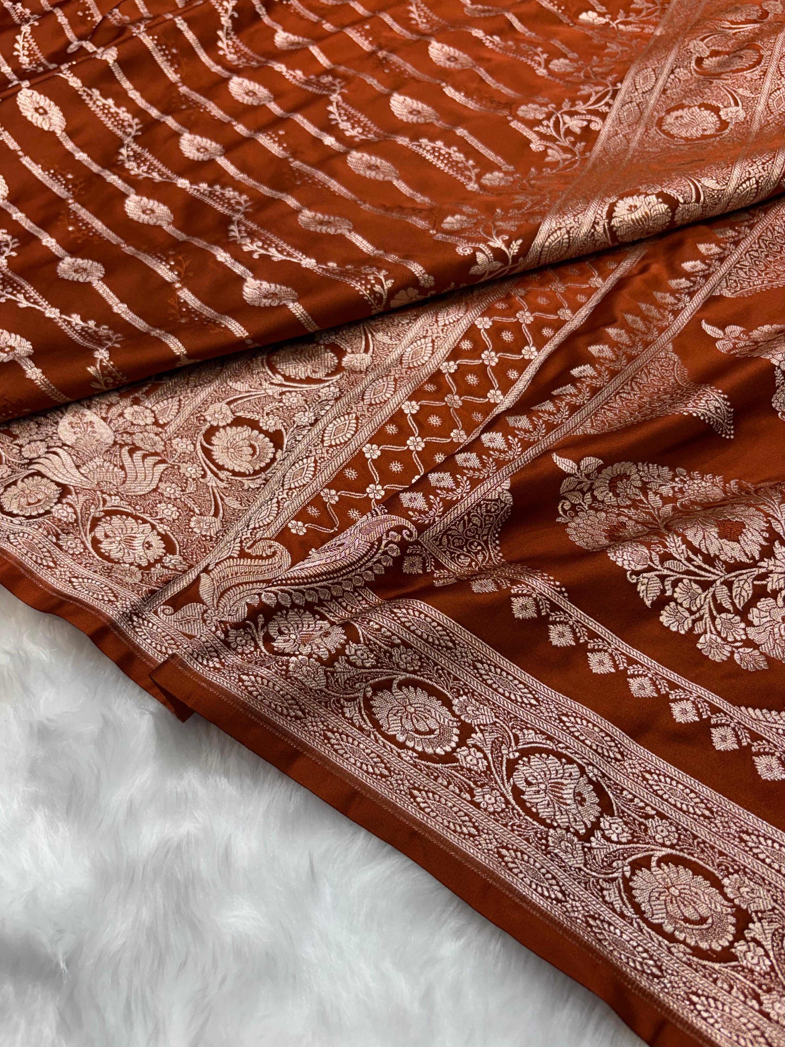 Burnt Copper Shades Floral Jaal with Vertical Stripe Motifs Pattern Mashru Silk Saree