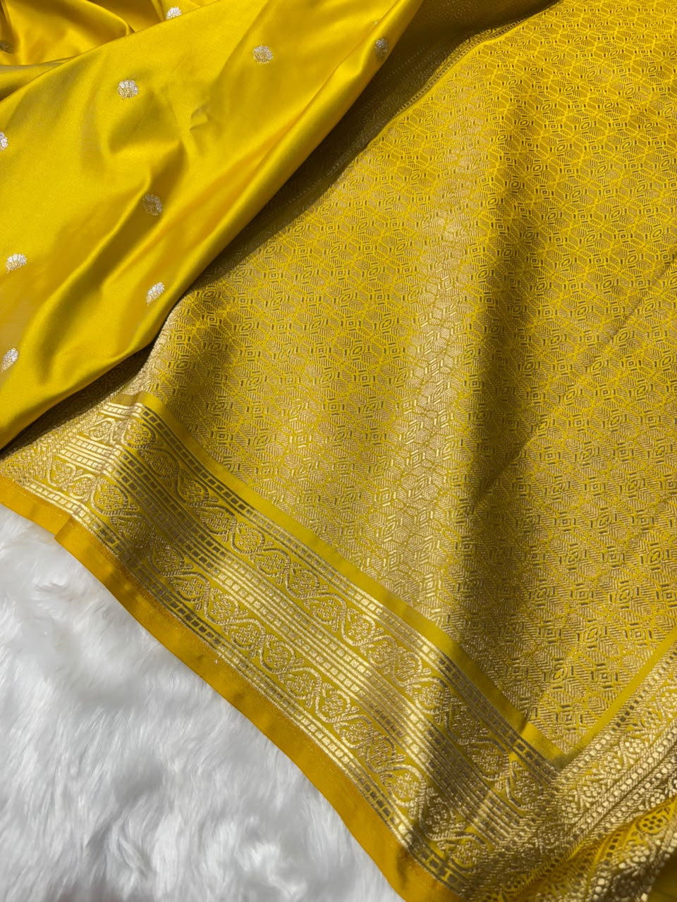 Mustard Yellow Shades Booti with Floral Border Mashru Silk Saree